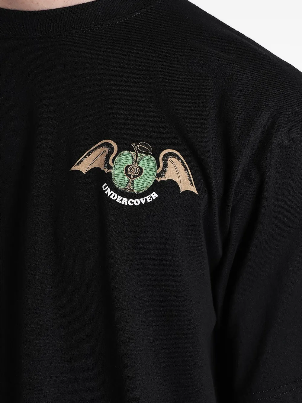 Undercover T-shirt met appelprint Zwart