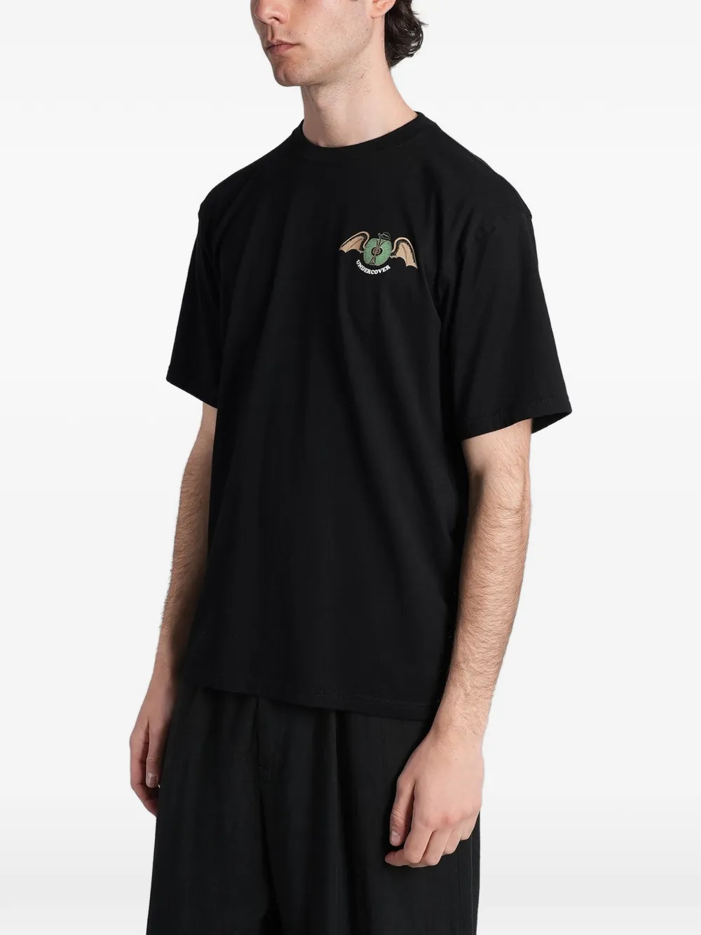 Undercover T-shirt met appelprint Zwart