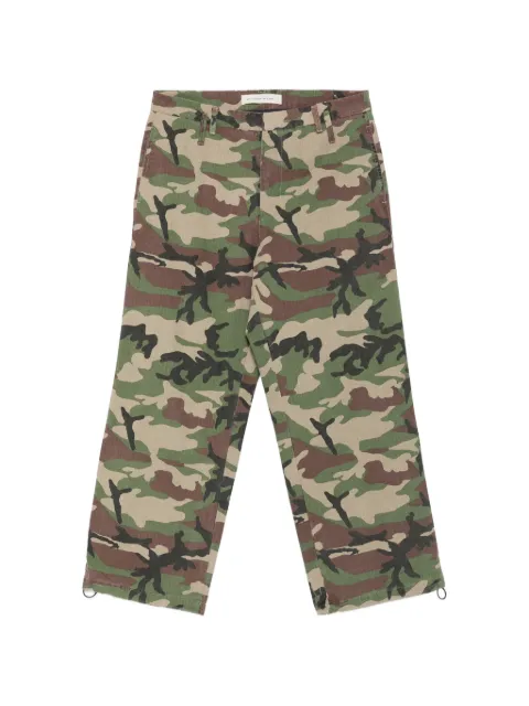 STAY HUMAN ON EARTH camouflage-print trousers