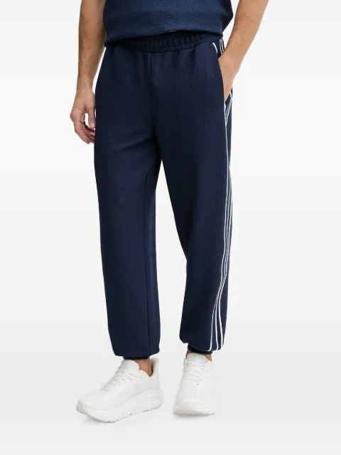 GUESS USA side-stripe track pants