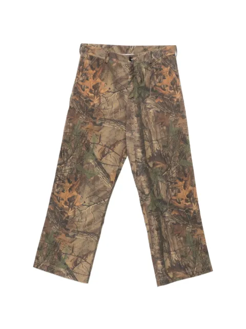 LC23 leaf-print trousers