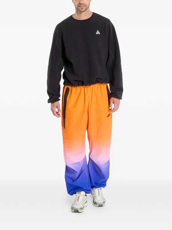 Nike トラックパンツ | オレンジ | FARFETCH JP