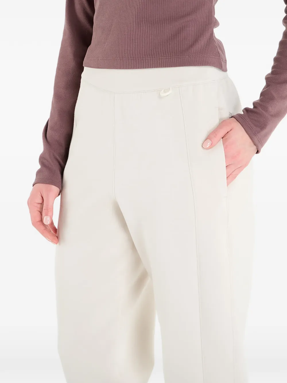 Nike 24.7 ImpossibleSoft trainingsbroek met toelopende pijpen Beige