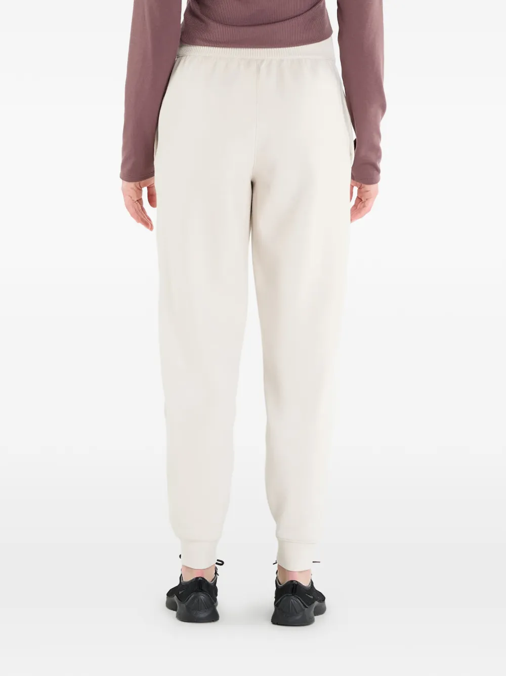 Nike 24.7 ImpossibleSoft trainingsbroek met toelopende pijpen Beige