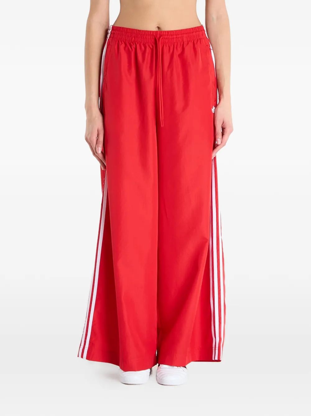 adidas Firebird Adilenium side-stripe track pants - Rosso
