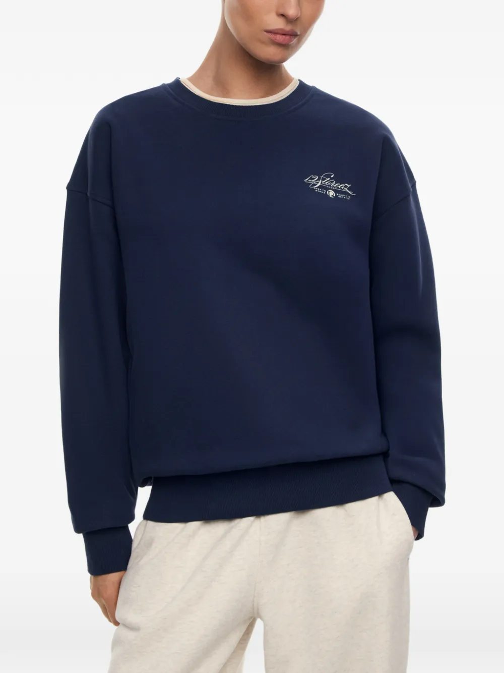12 STOREEZ Central Park sweater met logoprint Blauw