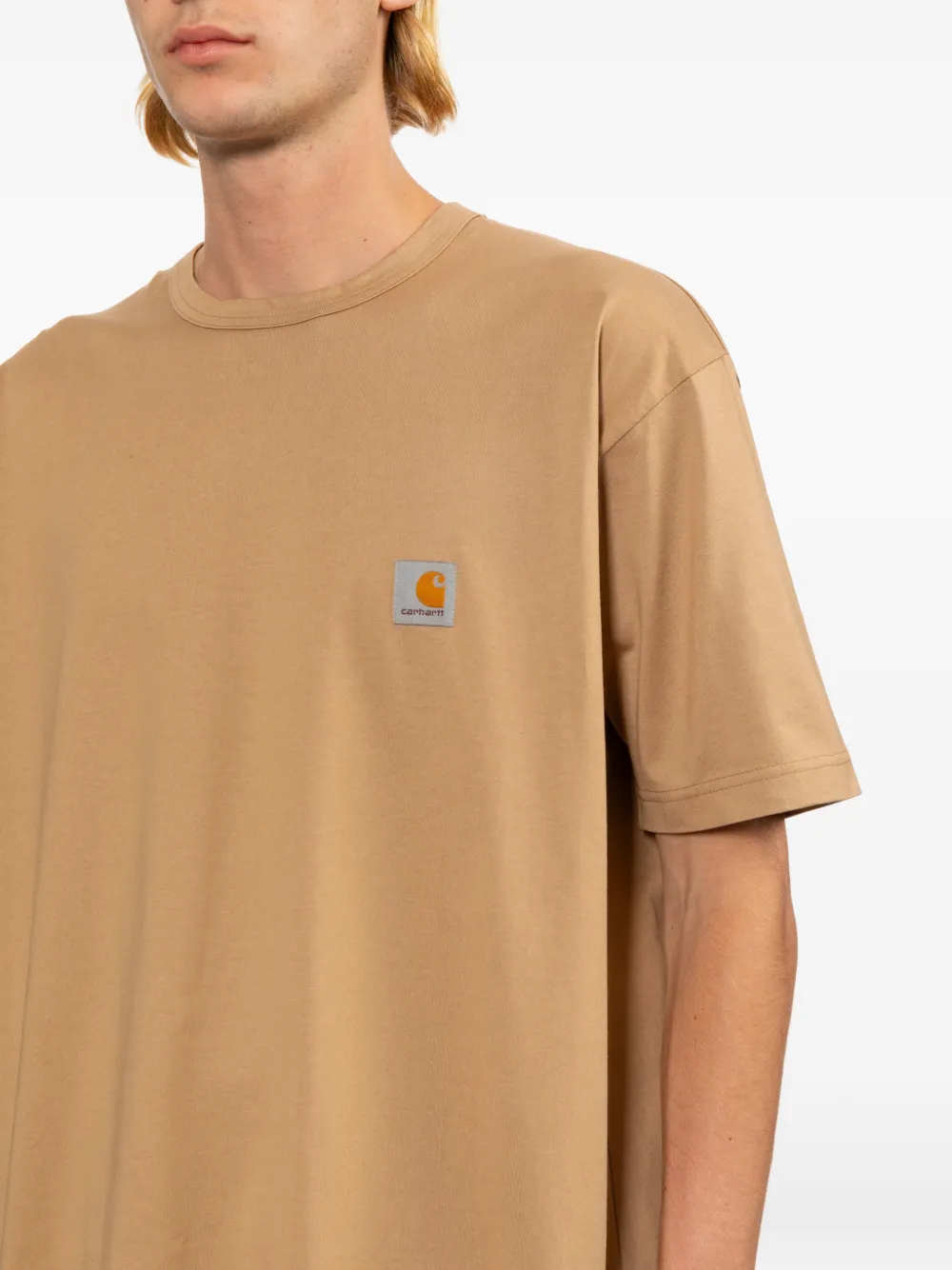 Junya Watanabe MAN x Carhartt T-shirt met logoprint Bruin