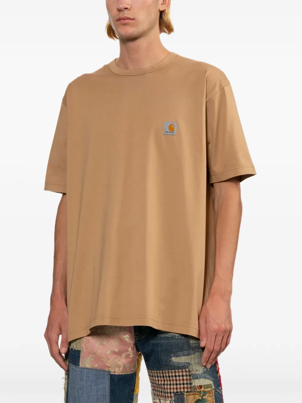 Junya Watanabe MAN x Carhartt T-shirt met logoprint Bruin