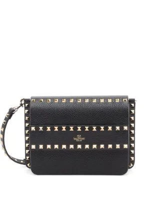Valentino Garavani スタッズ クラッチバッグ | ブラック | FARFETCH JP