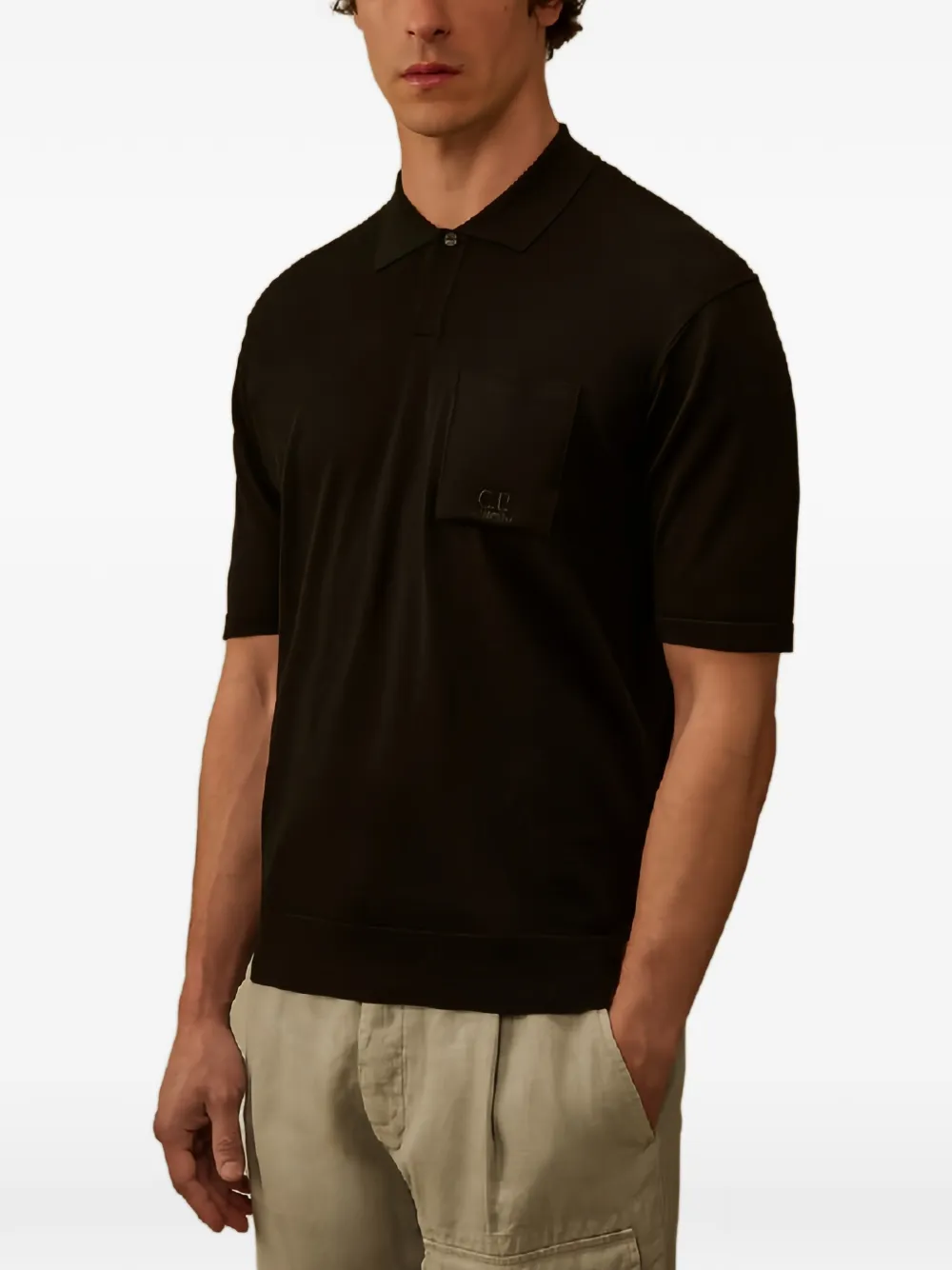 C.P. Company Poloshirt met geborduurd logo en zak op de borst Zwart
