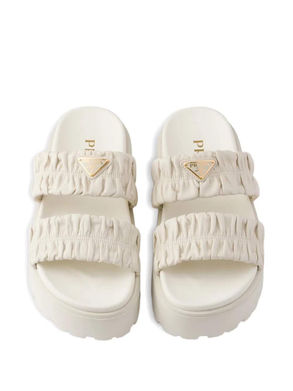 Prada Matelassé nappa leather flatform slides Beige