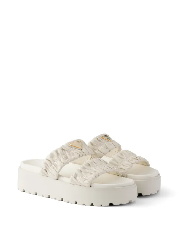 Prada Matelassé Nappa Leather Flatform Slides | Neutrals | FARFETCH