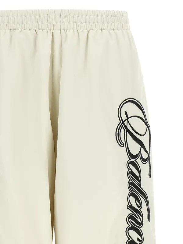 Balenciaga Cursive Reversible Track Pants | White | FARFETCH