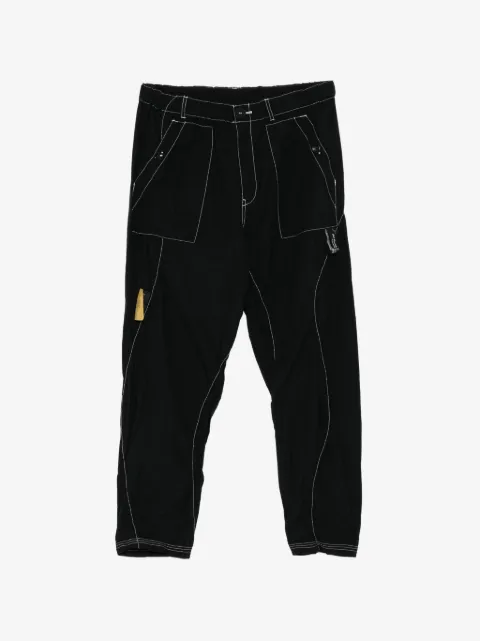 Undercover pantalones tapered con costuras en contraste