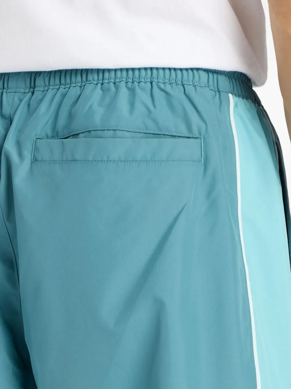 New Balance Trackside Woven trainingsbroek Blauw
