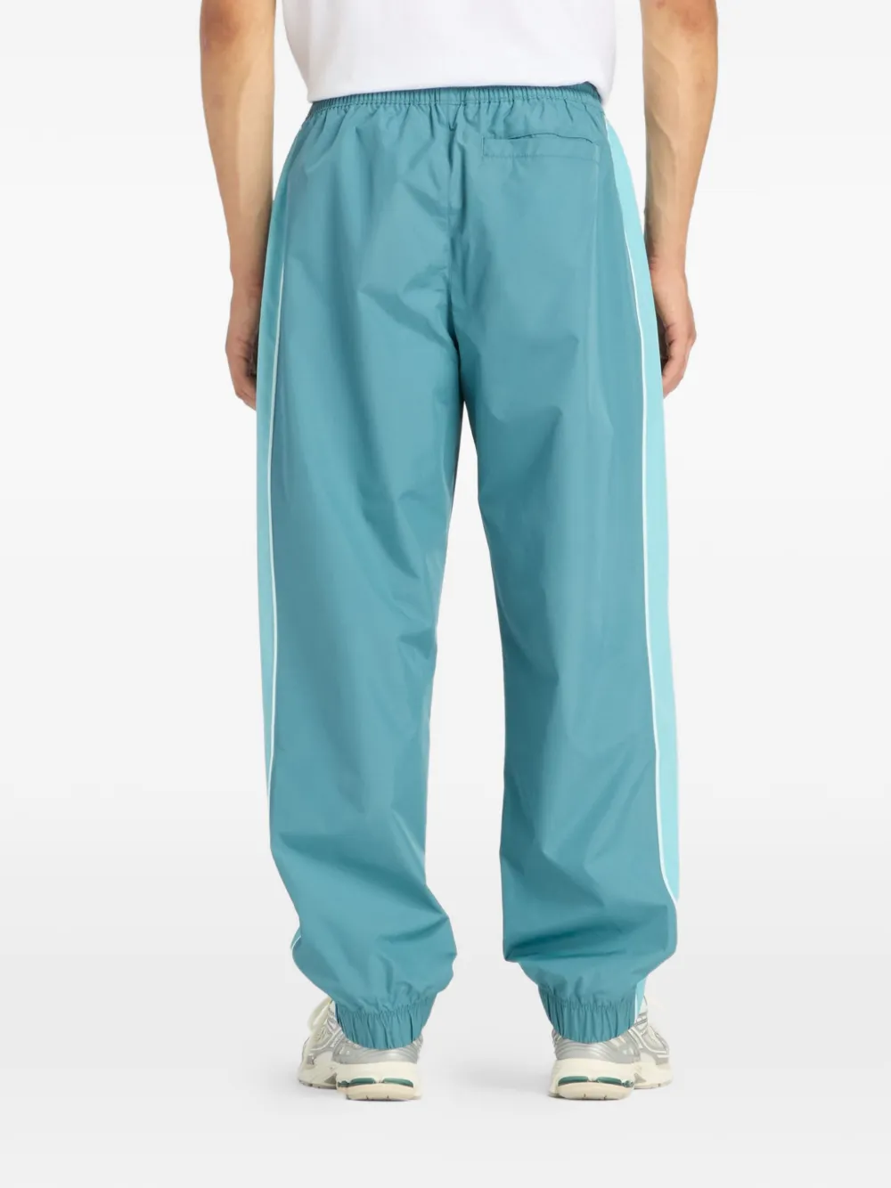 New Balance Trackside Woven trainingsbroek Blauw