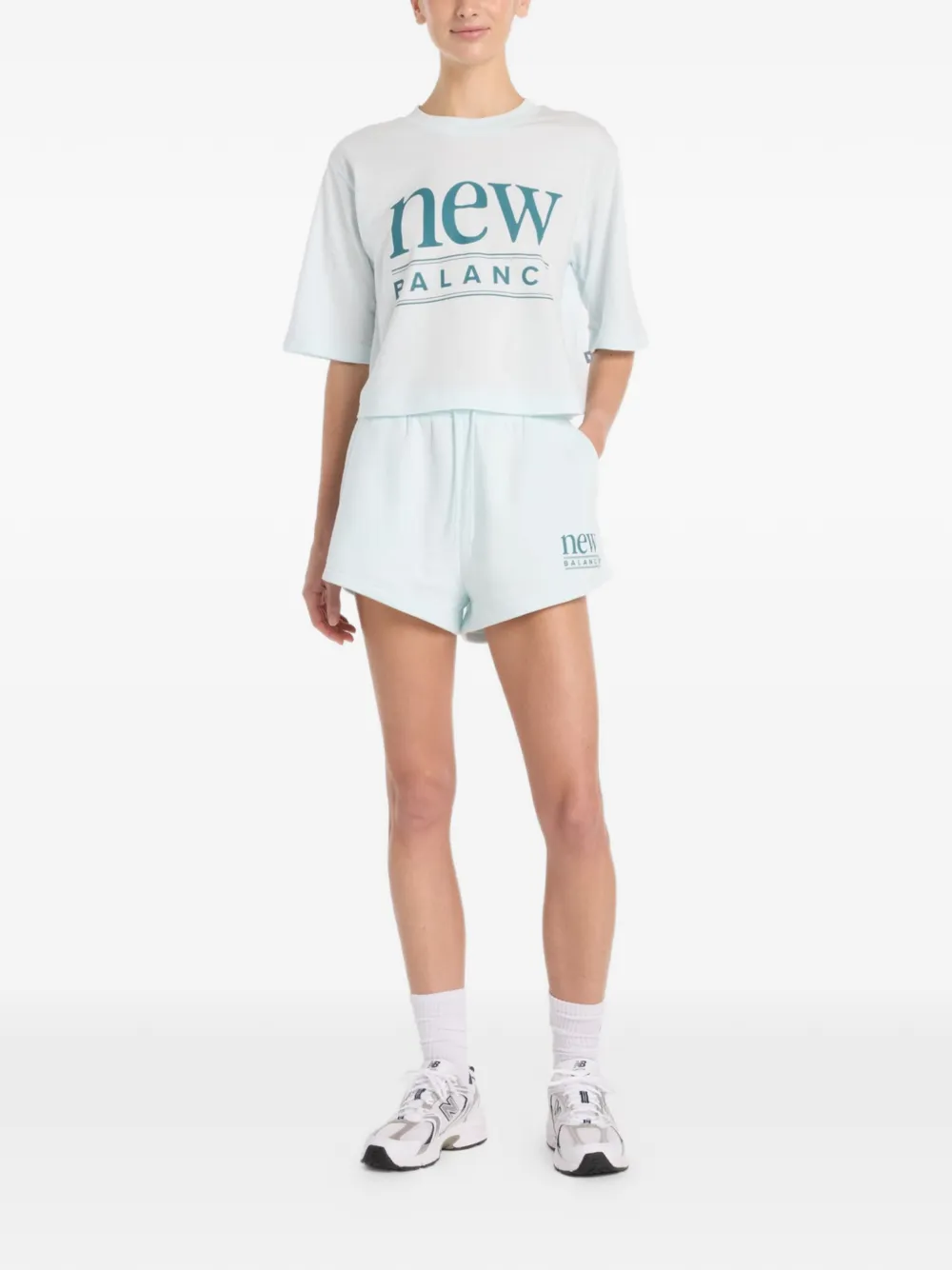 New Balance Reimagined Fleece shorts met logo-print Blauw