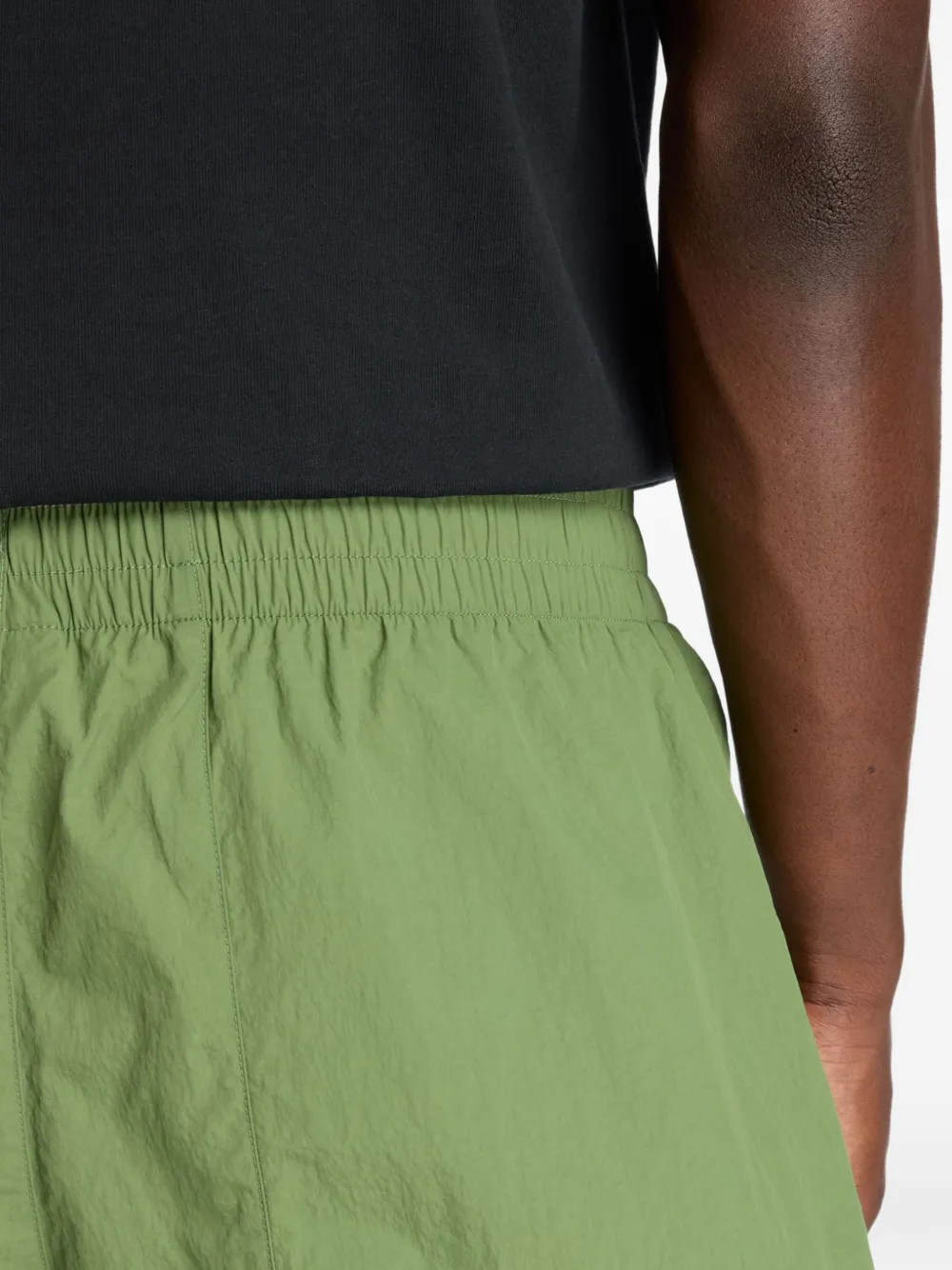New Balance Castlefield Woven 7" shorts Groen