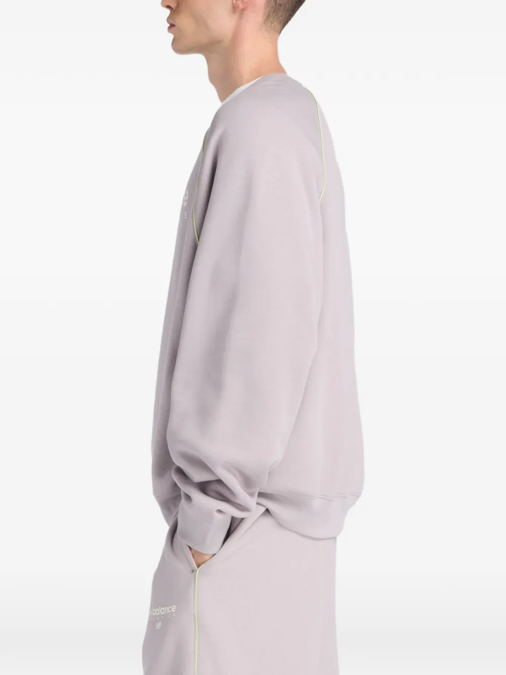 New Balance Trackside Fleece sweater met ronde hals Paars
