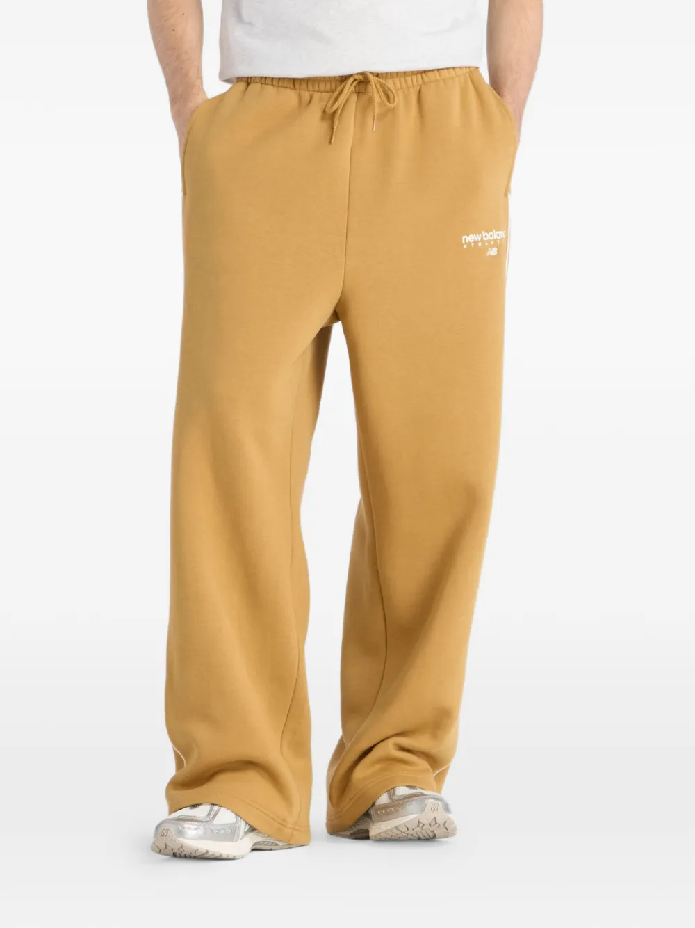 New Balance Trackside Fleece track pants - Giallo