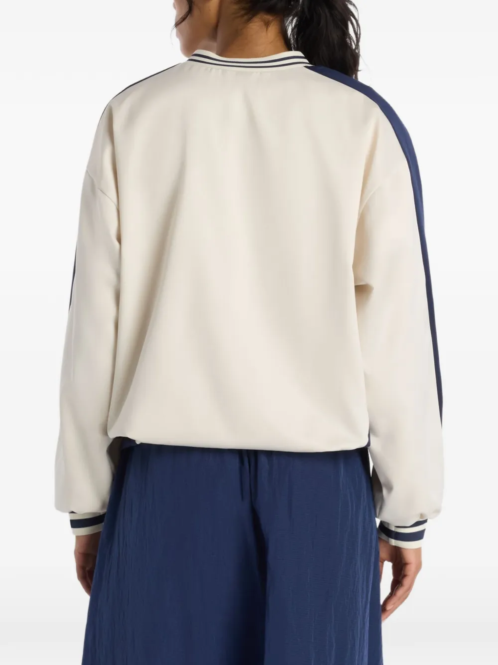 New Balance Satijnen sweater met gestreepte afwerking Beige