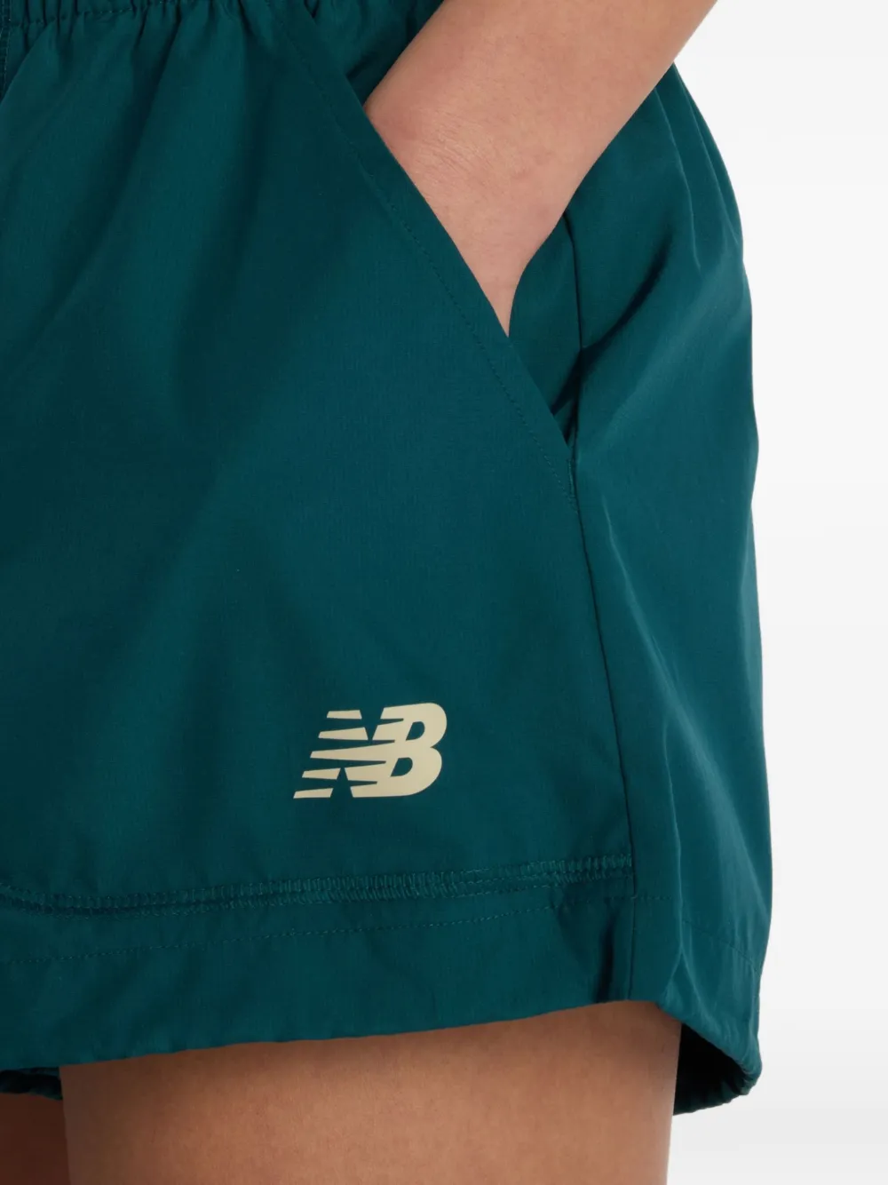 New Balance Trackside geweven shorts Groen