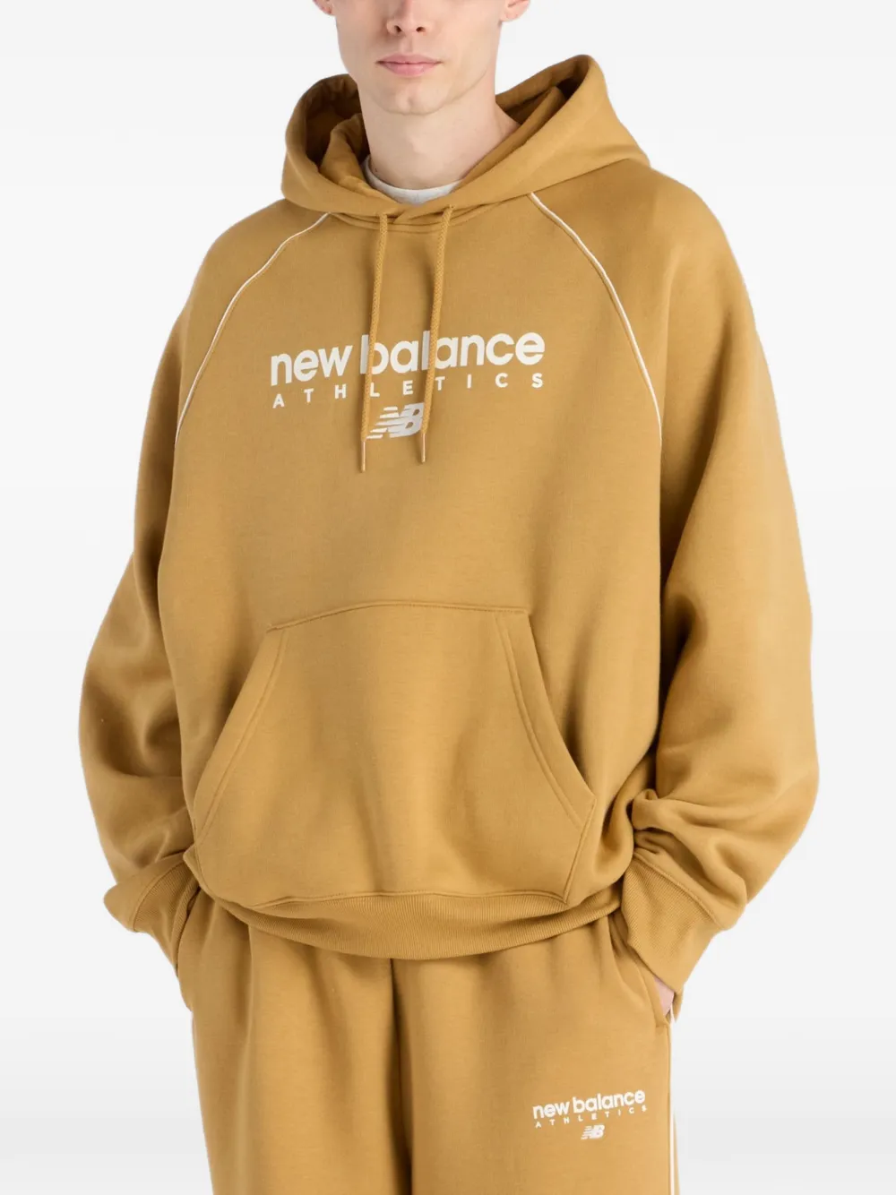 New Balance Trackside Fleece hoodie - Gelb