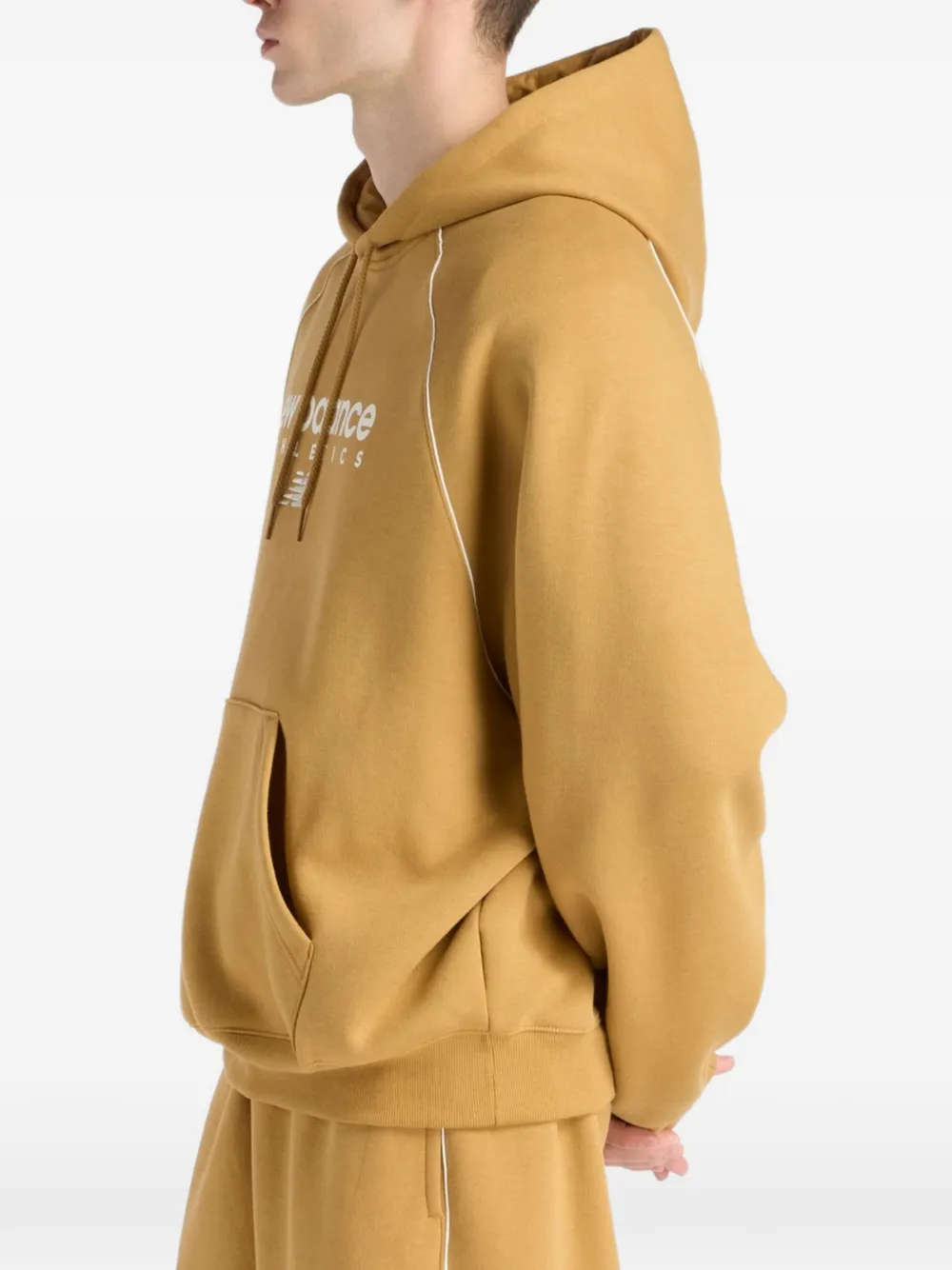 New Balance Trackside fleece hoodie Geel