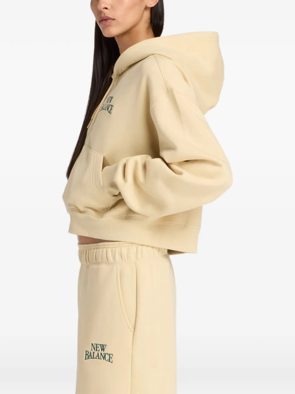 New Balance Trackside fleece hoodie met rits Beige