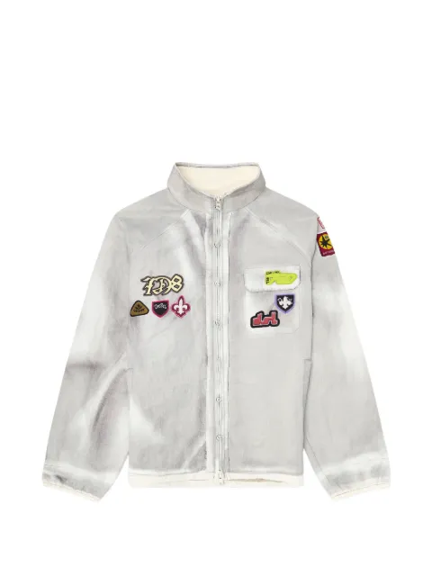 Diesel windbreaker with trompe l’oeil patches