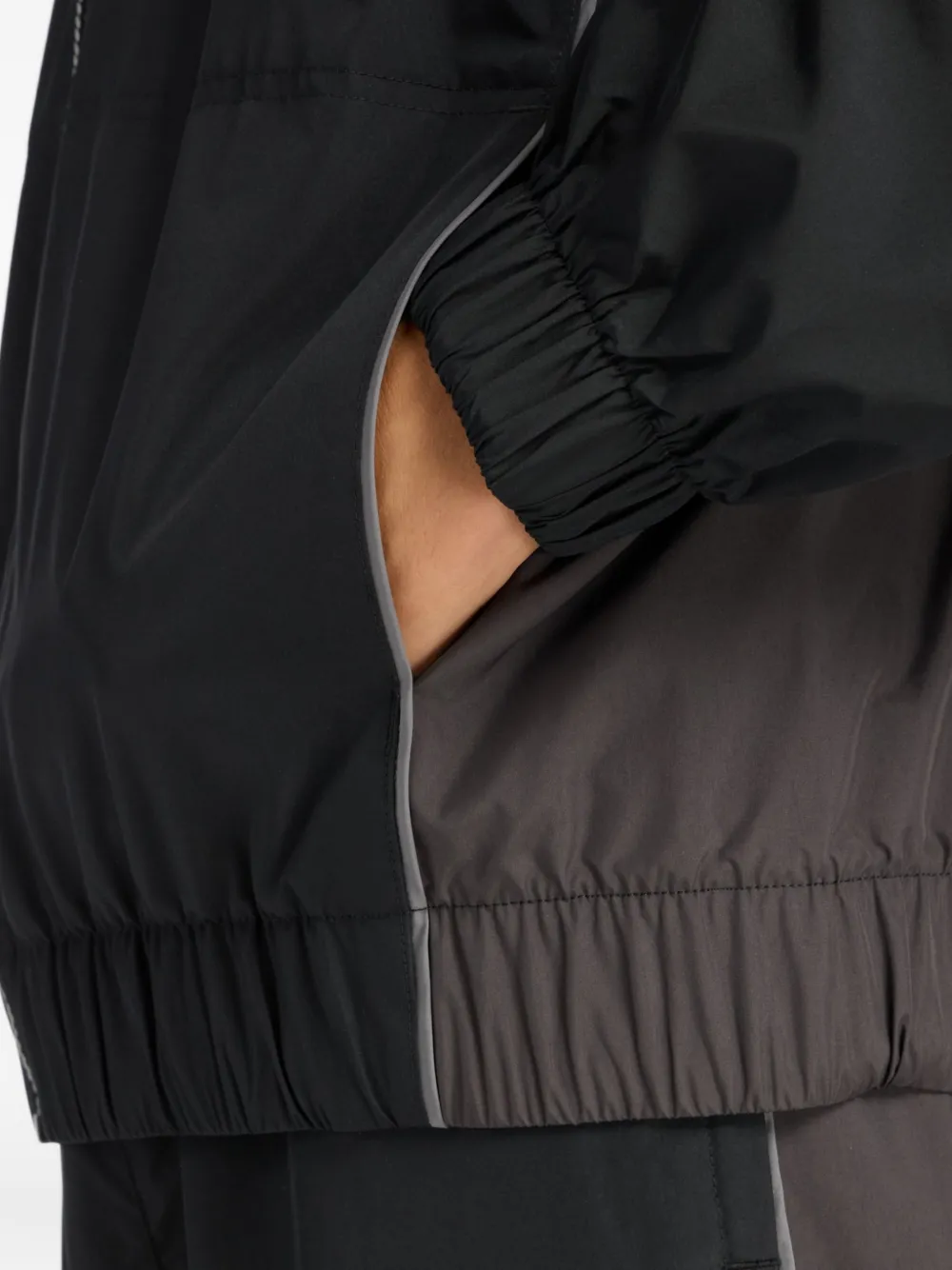 New Balance Tackside jack met afwerking Zwart