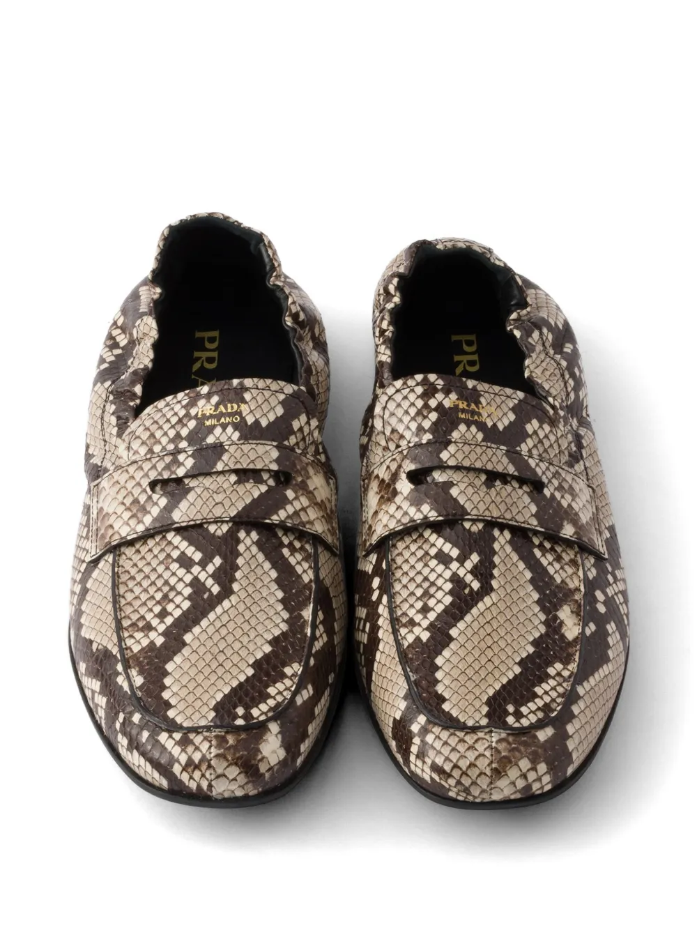 Prada Shuffle Ayers leren loafers met print Bruin