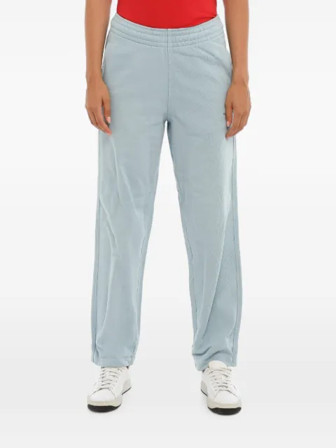 Holzweiler logo-print blue track pants