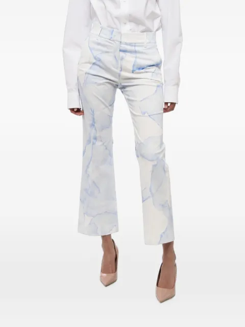 True Royal pantalones blancos con estampado jaspeado