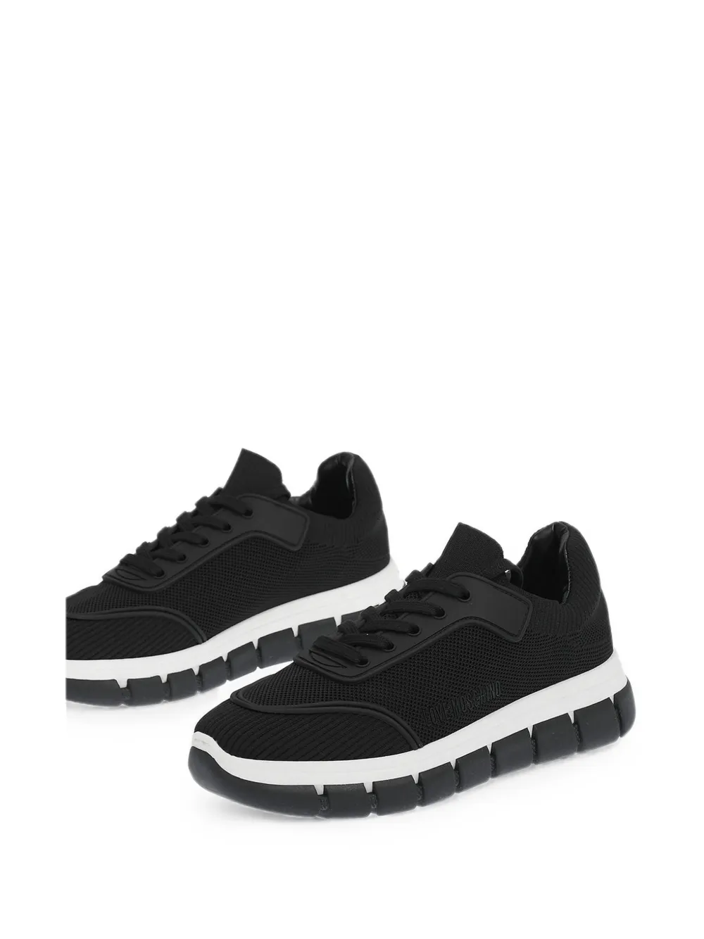 Moschino perforated track-sole sneakers Zwart