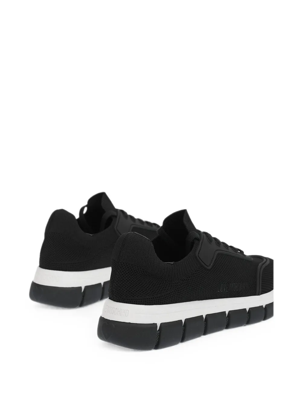 Moschino perforated track-sole sneakers Zwart