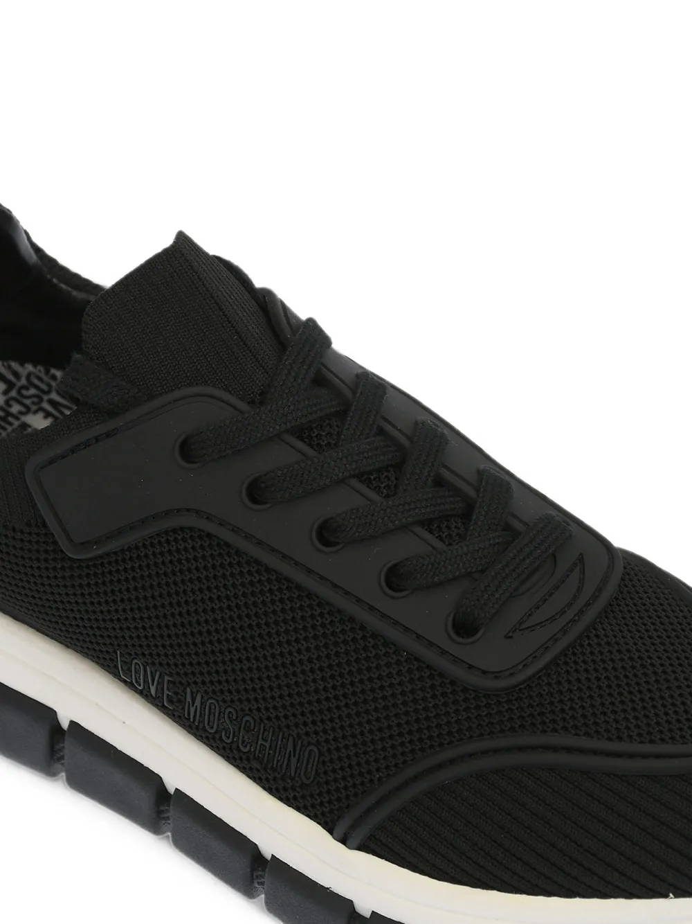 Moschino perforated track-sole sneakers Zwart