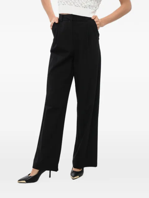 John Richmond pantalones plisados