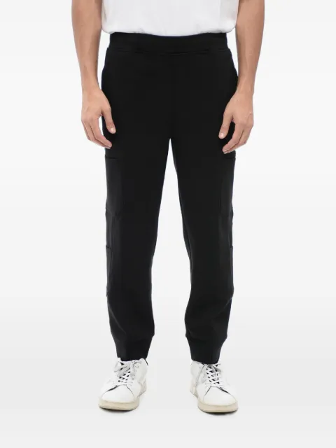 Neil Barrett pantalon de jogging en coton à lien de resserrage et poches cargo