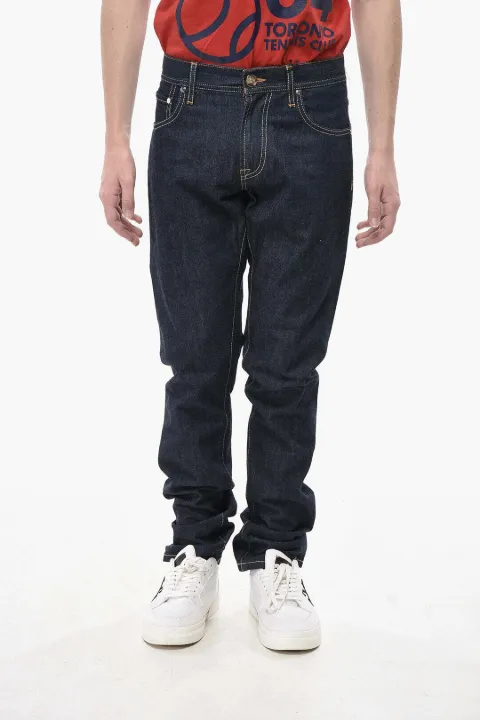 Corneliani jeans slim con costuras en contraste