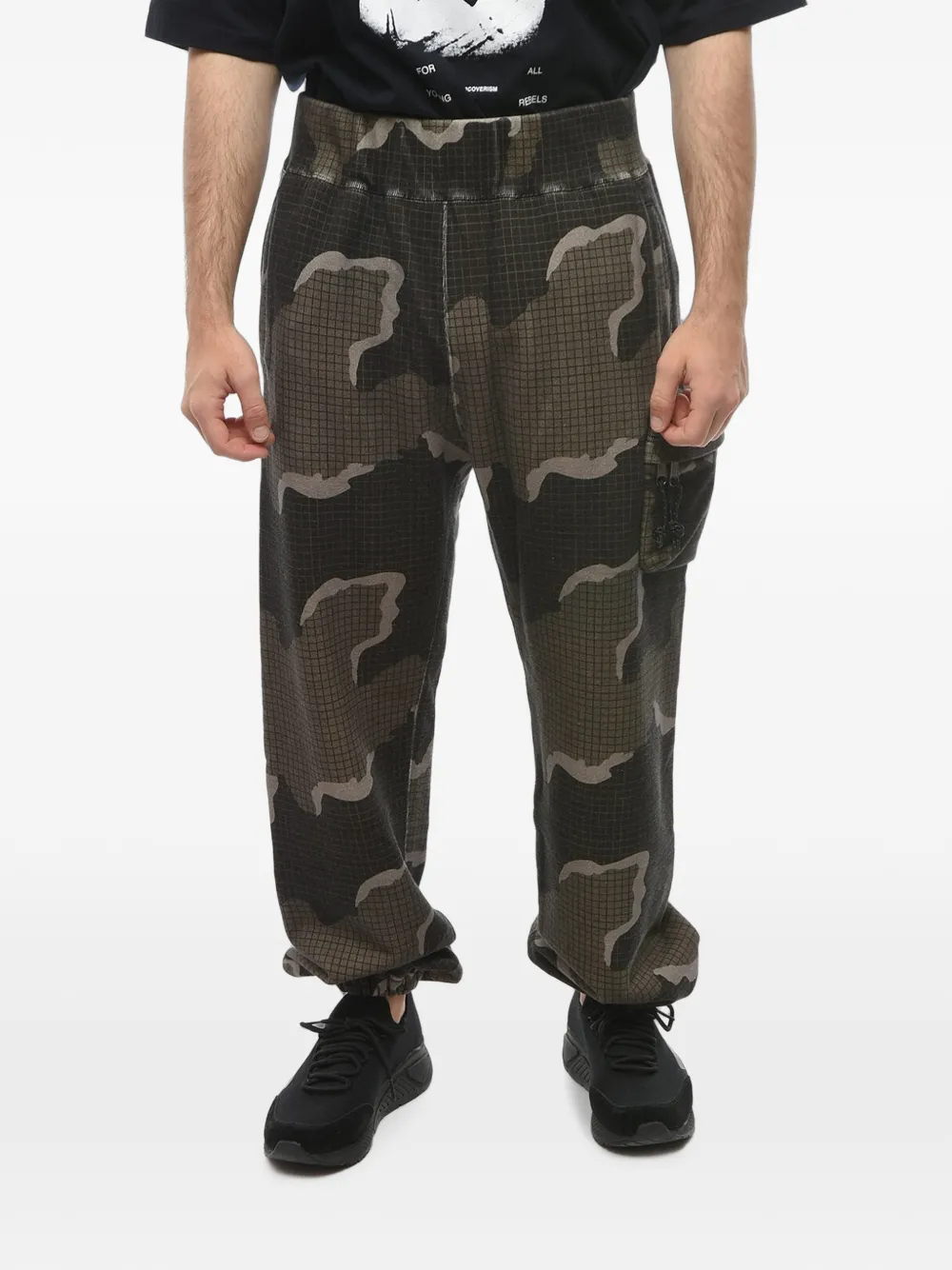 Undercover x Eastpak camouflage-print cotton track pants - Braun