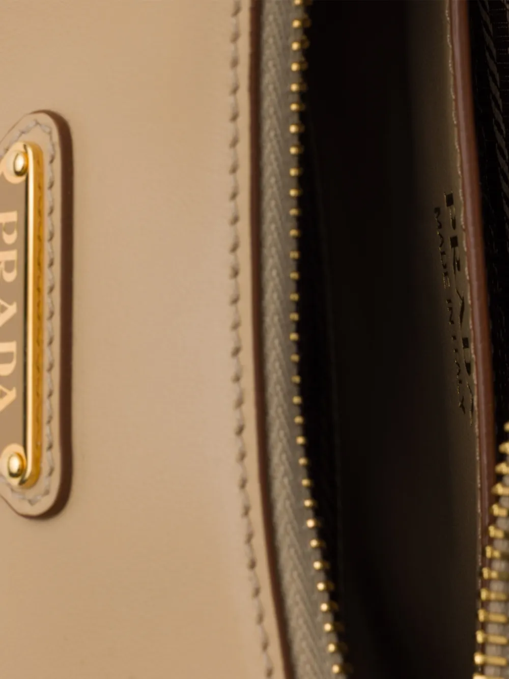 Prada Arqué mini leren schoudertas Beige