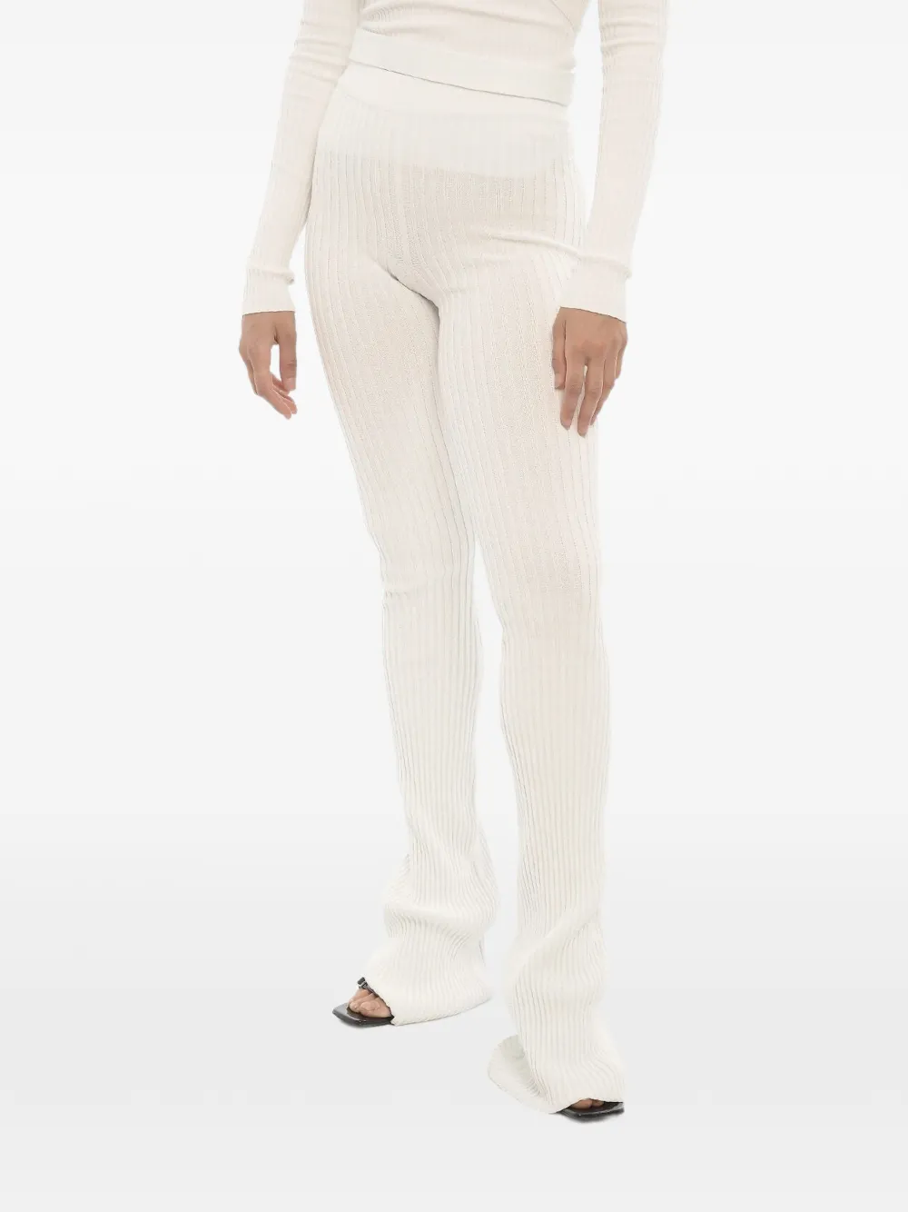 ANDREĀDAMO ribbed-knit flared trousers - Weiß