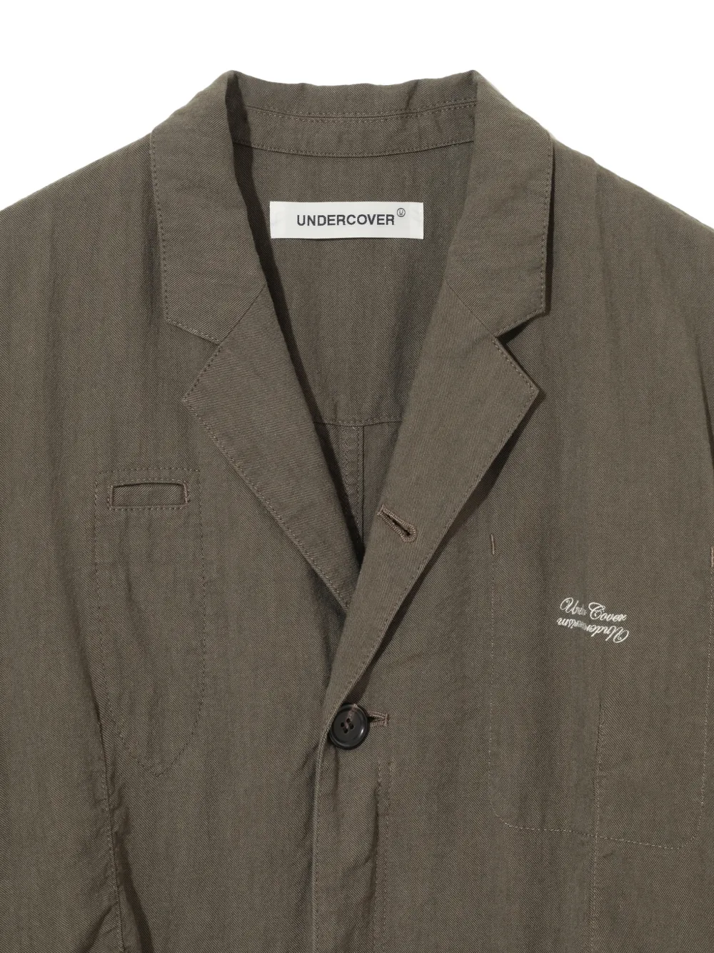 Undercover Jack met gekerfde revers en logoprint Groen