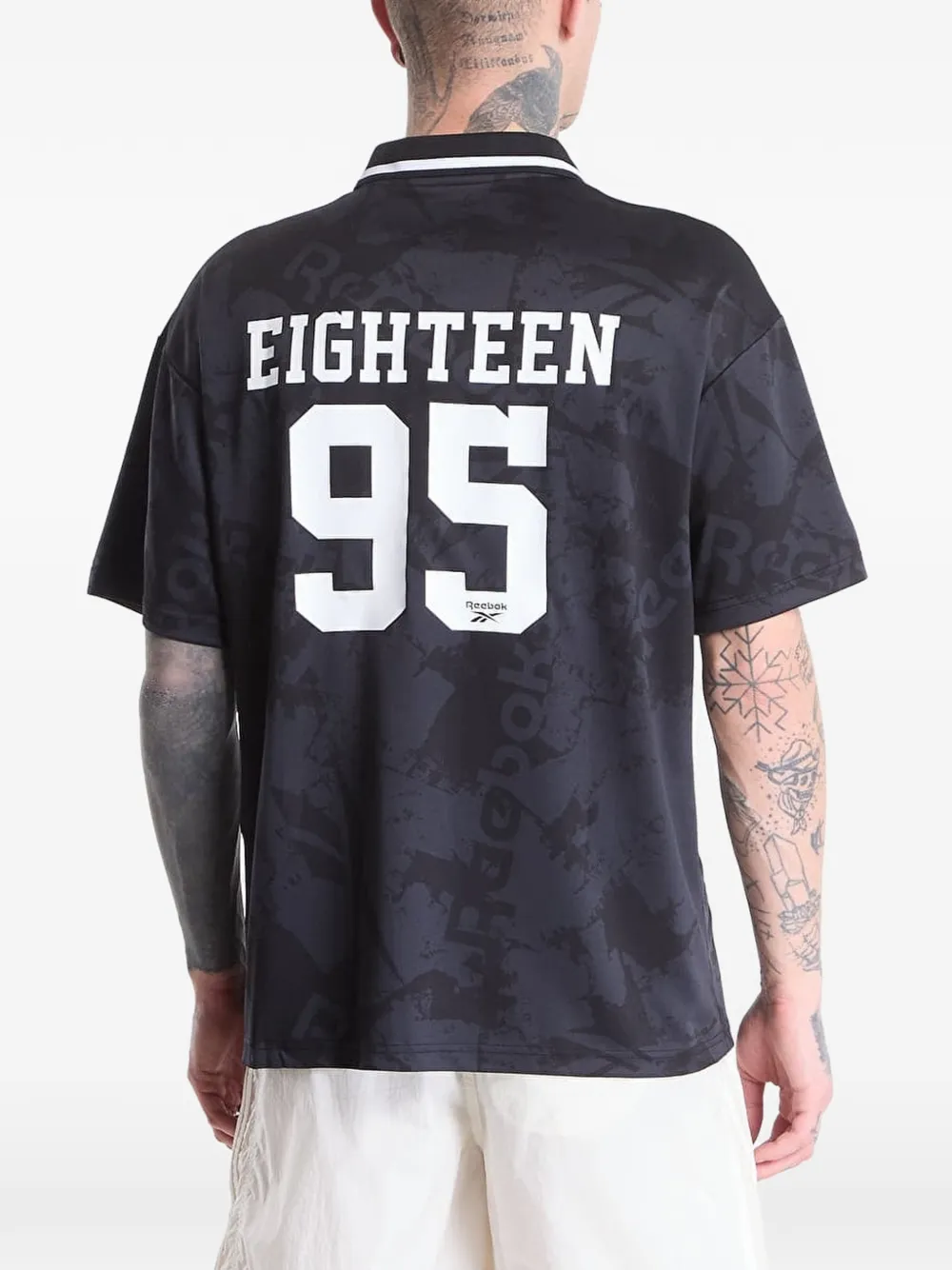 Reebok T-shirt met logo-print en kraag Zwart