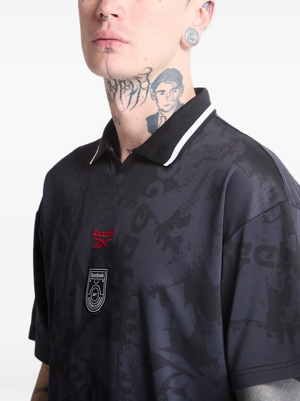 Reebok T-shirt met logo-print en kraag Zwart