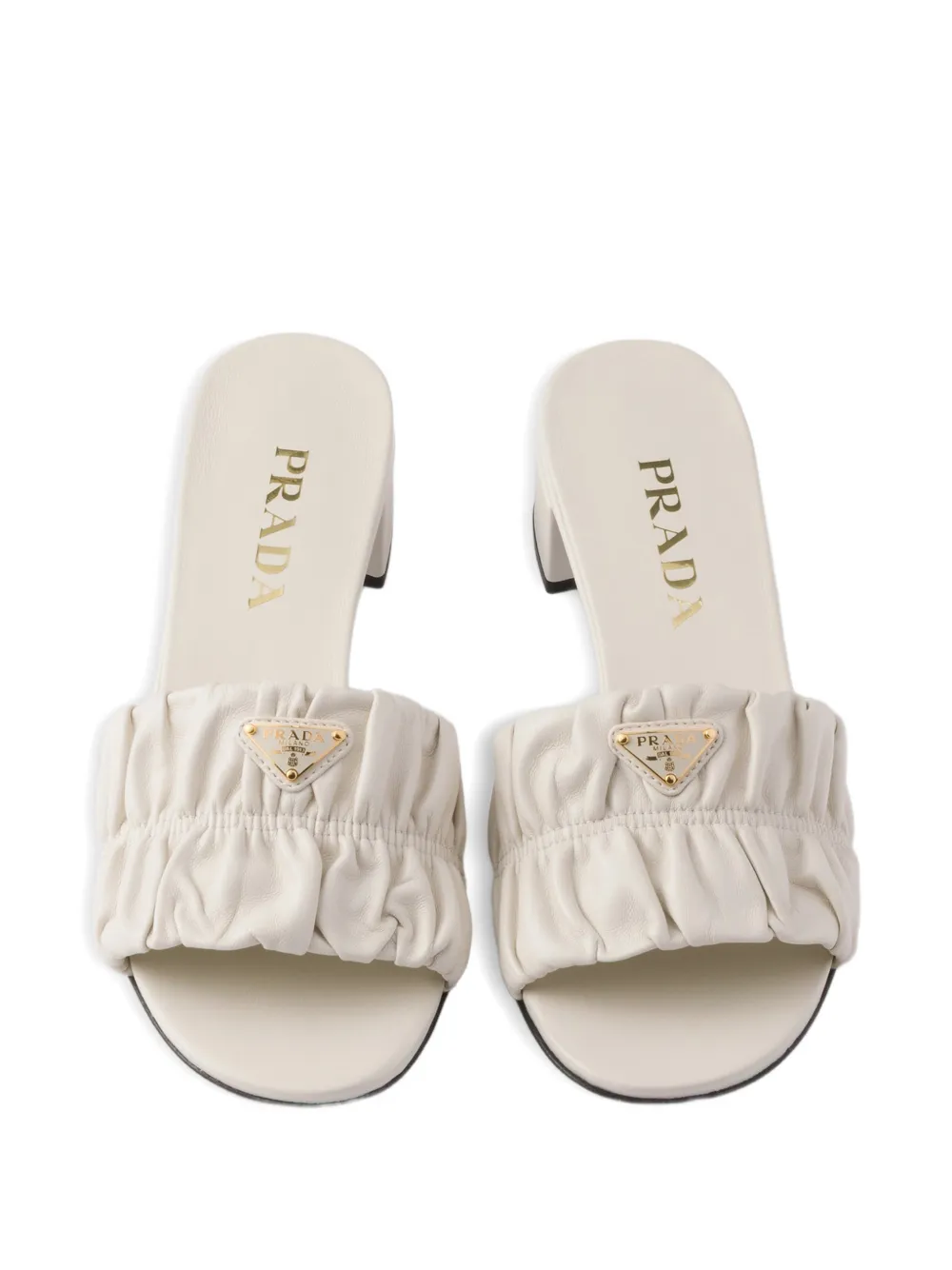 Prada matelassé nappa leather slides Beige