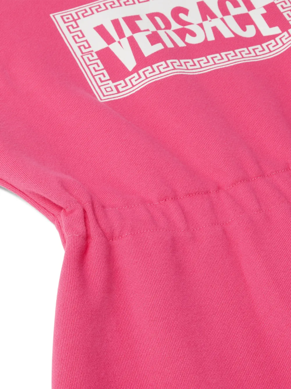 Versace Kids Katoenen jersey sweaterjurk met print Roze