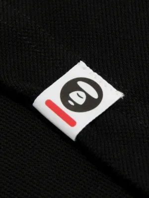 Moonface logo-patch polo shirt 8