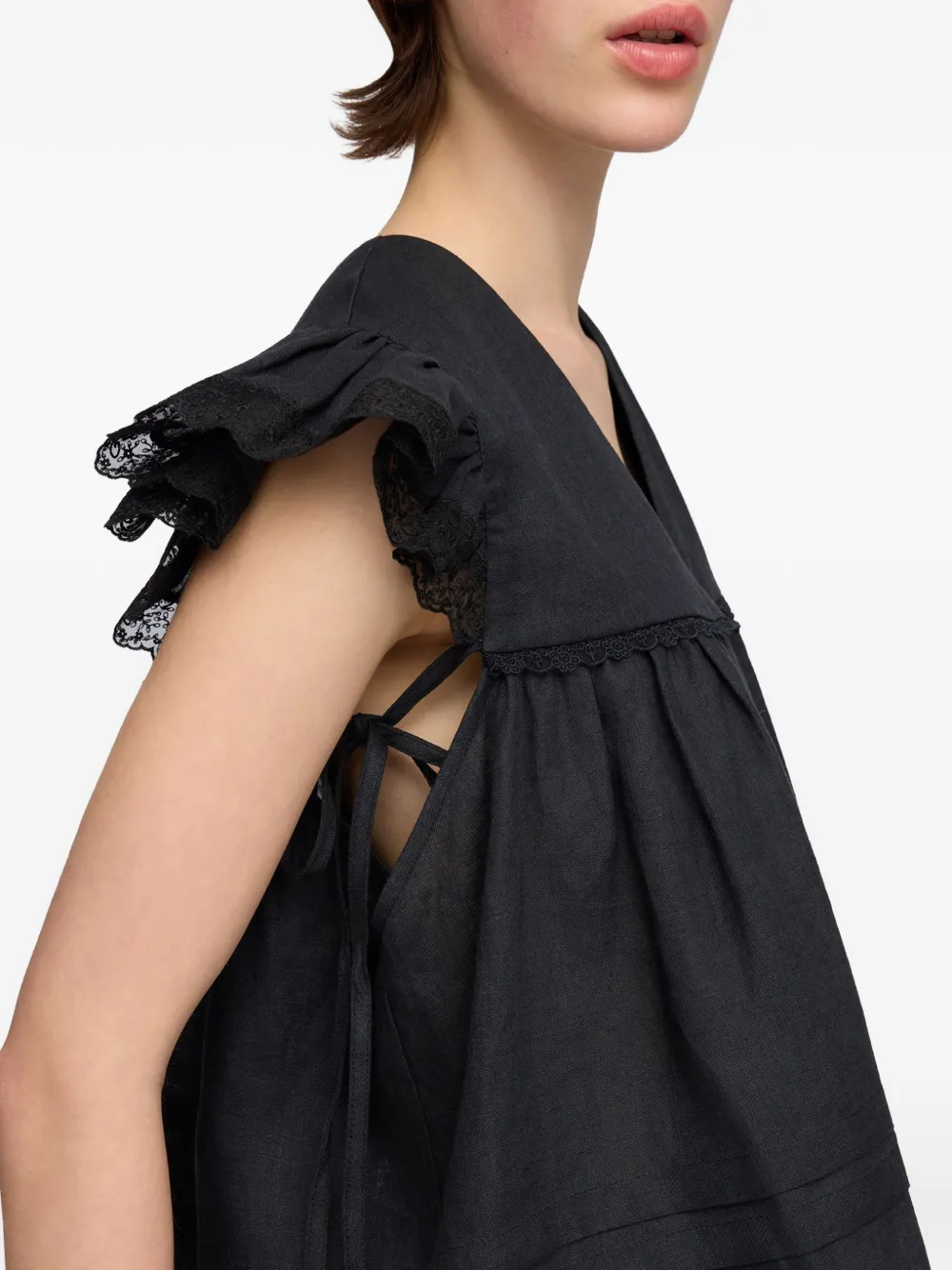 GANNI Blouse met ruches en kanten afwerking Zwart